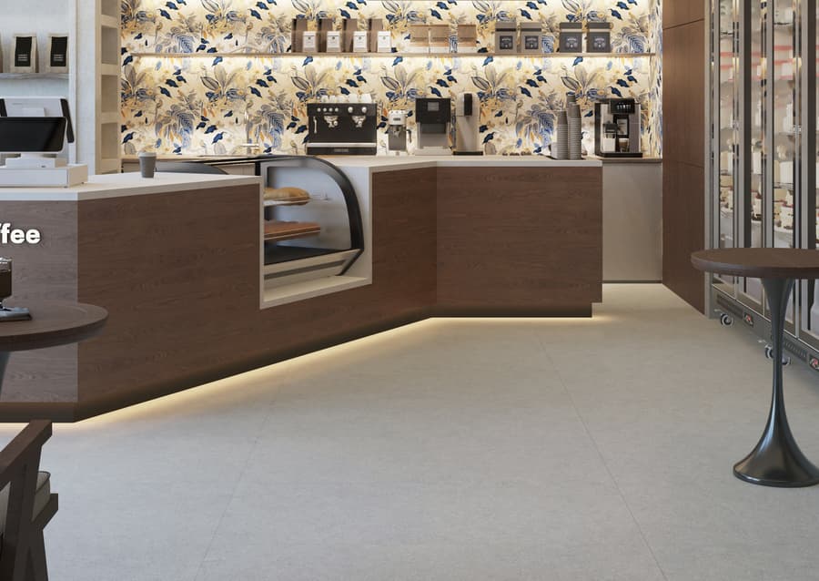 Representative limestone porcelain floor in a bright retail interior